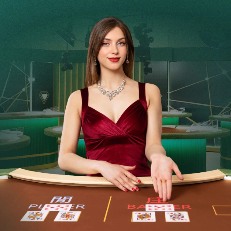 Image for an online casino game featuring a female dealer in a red dress at a gaming table. She is positioned in front of cards, with labels 'PLAYER' and 'BANKER' visible on the table. The background shows a stylish casino setting.